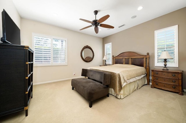 carpeted bedroom featuring ceiling fan