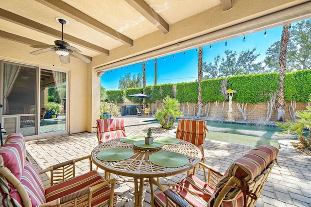 view of patio featuring pool water feature and ceiling fan