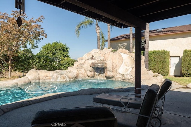 exterior details with a pool