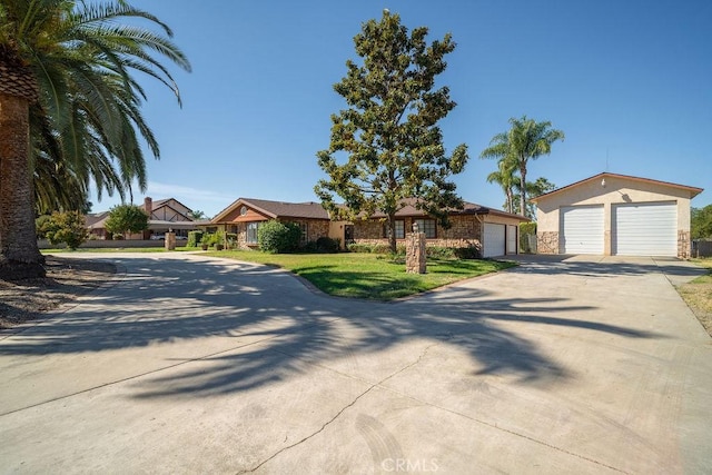 ranch-style house featuring a garage