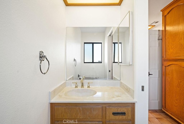 bathroom featuring vanity and tile patterned flooring