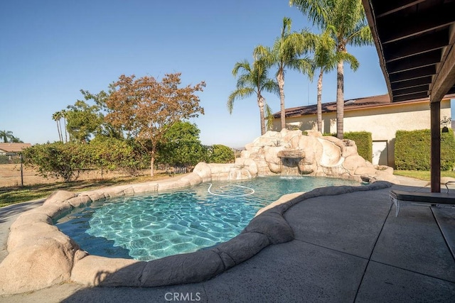 view of pool featuring pool water feature