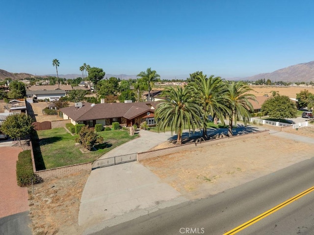 view of front of property with a mountain view