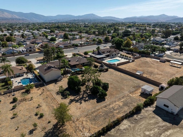 drone / aerial view featuring a mountain view