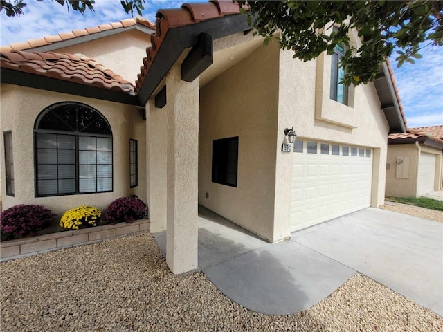 view of home's exterior featuring a garage