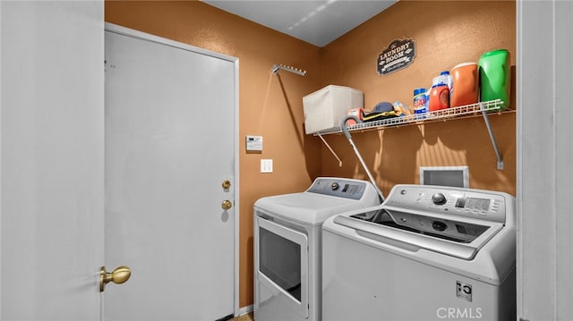 laundry area featuring independent washer and dryer