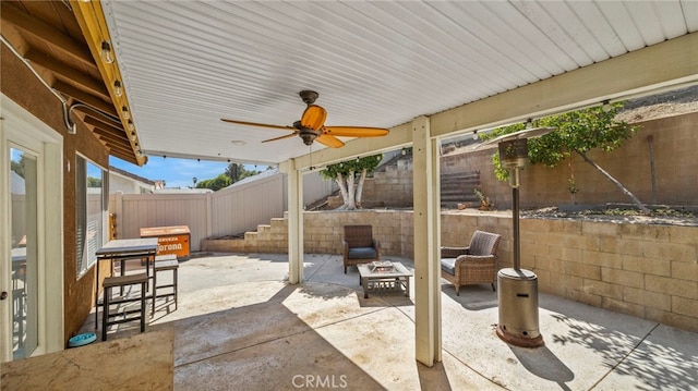 view of patio with ceiling fan