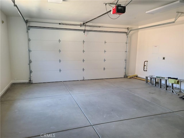 garage featuring a garage door opener