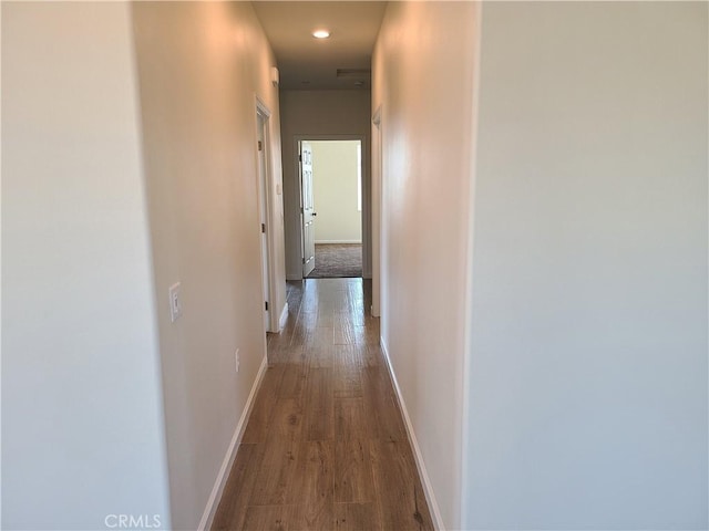 hallway with light wood-type flooring