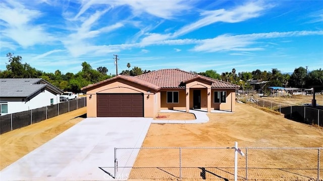 view of front of property featuring a garage