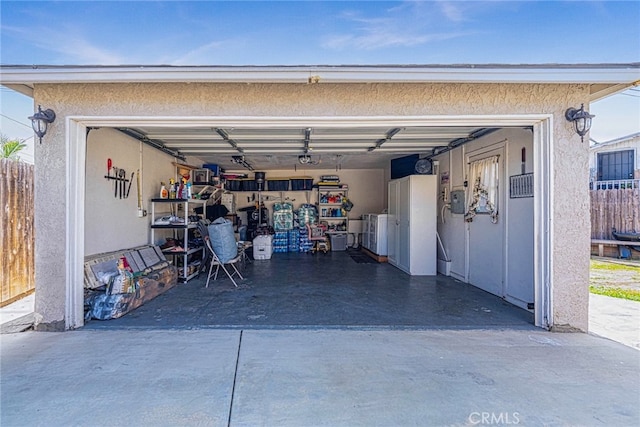 garage featuring washer and clothes dryer