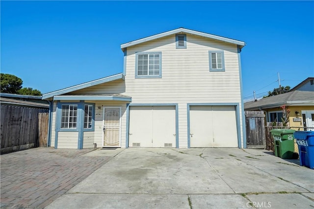 view of front of property featuring a garage