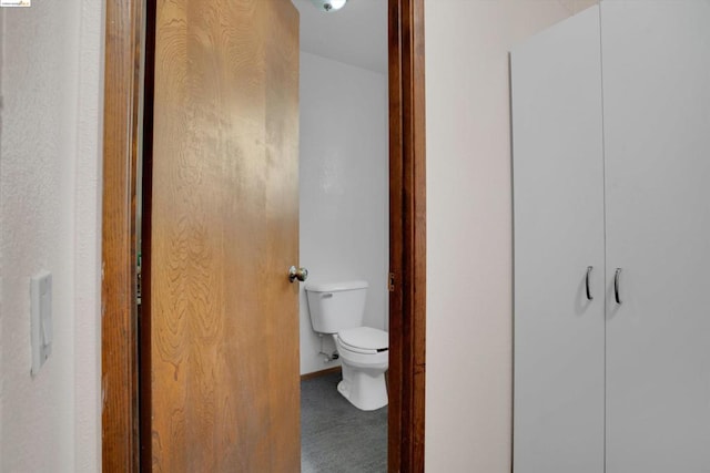 bathroom featuring toilet