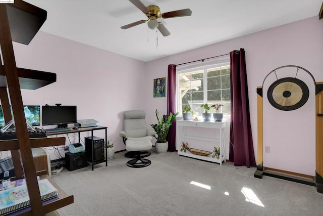 office with light colored carpet and ceiling fan