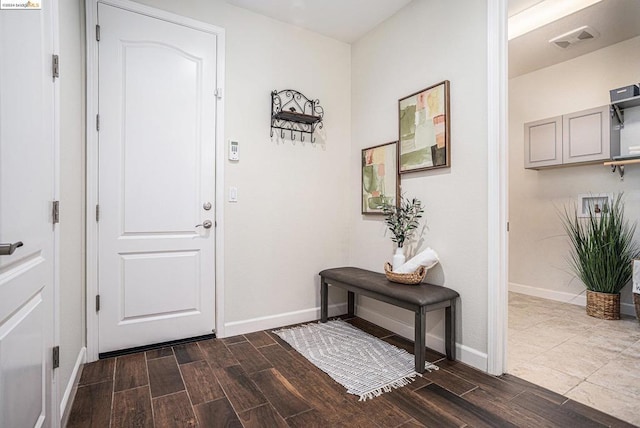 entrance foyer featuring dark hardwood / wood-style flooring