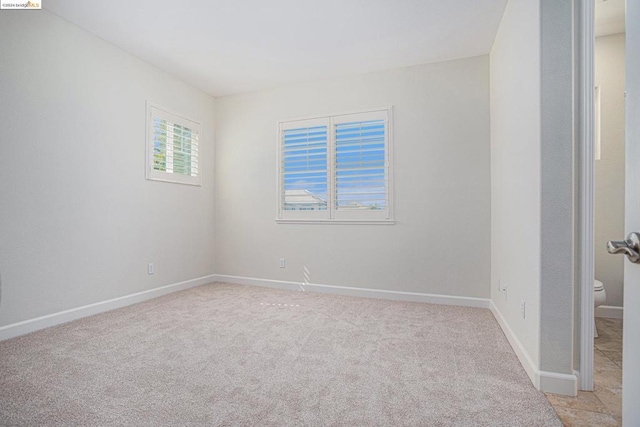 view of carpeted spare room