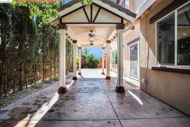 view of patio featuring ceiling fan