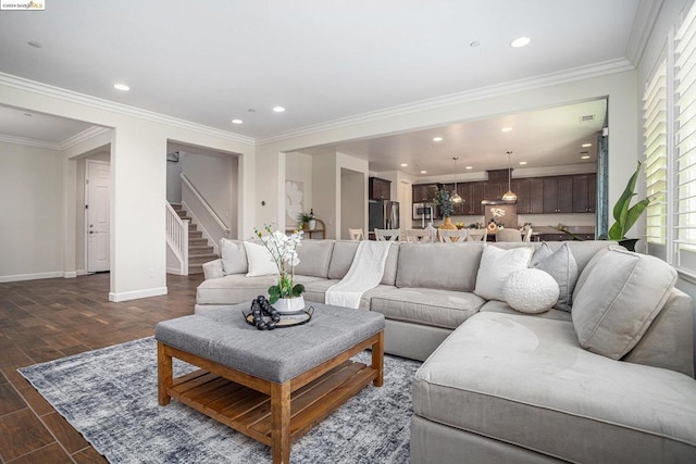 living room featuring dark hardwood / wood-style floors and crown molding