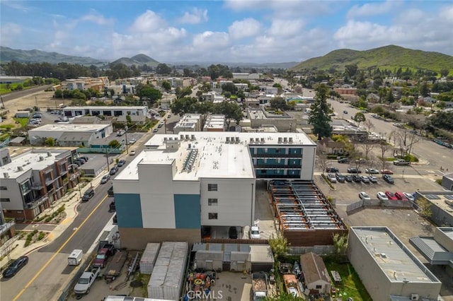 drone / aerial view featuring a mountain view