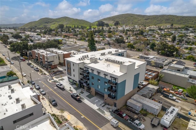 drone / aerial view featuring a mountain view