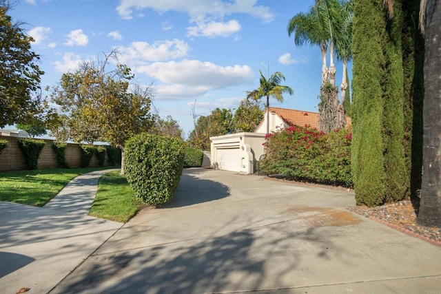 view of yard featuring a garage