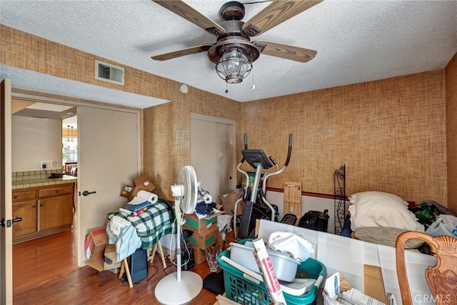 interior space featuring ceiling fan