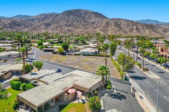 birds eye view of property featuring a mountain view