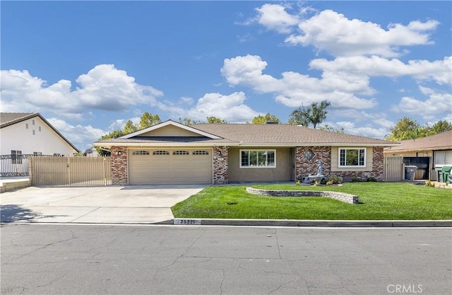 ranch-style home featuring a front lawn and a garage