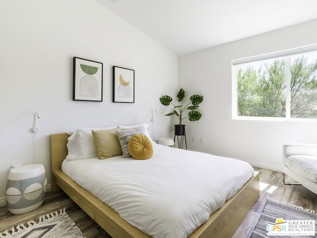 bedroom featuring hardwood / wood-style flooring