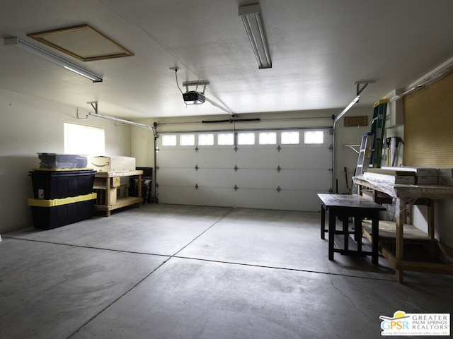 garage featuring a garage door opener