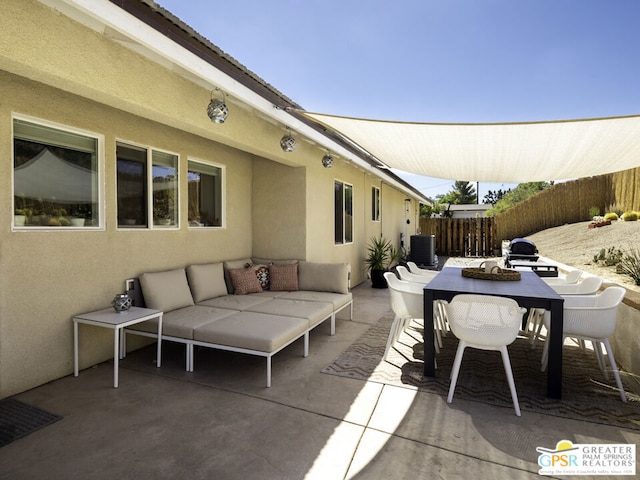 view of patio / terrace featuring an outdoor living space and central air condition unit