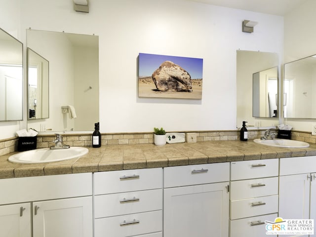 bathroom featuring vanity