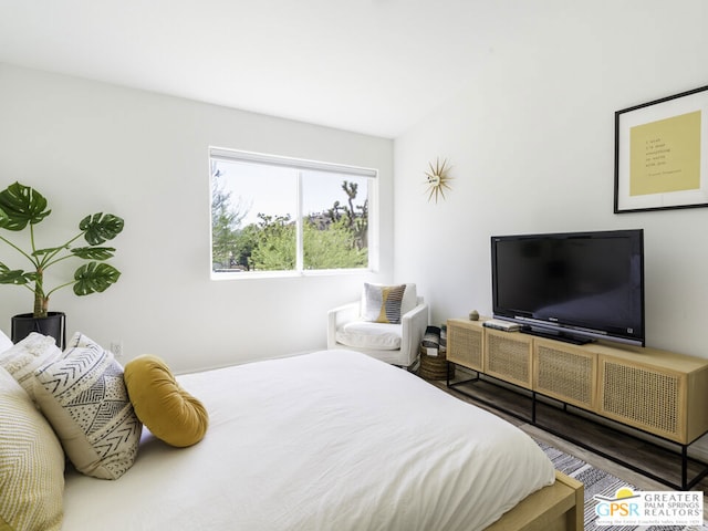 bedroom featuring dark hardwood / wood-style floors