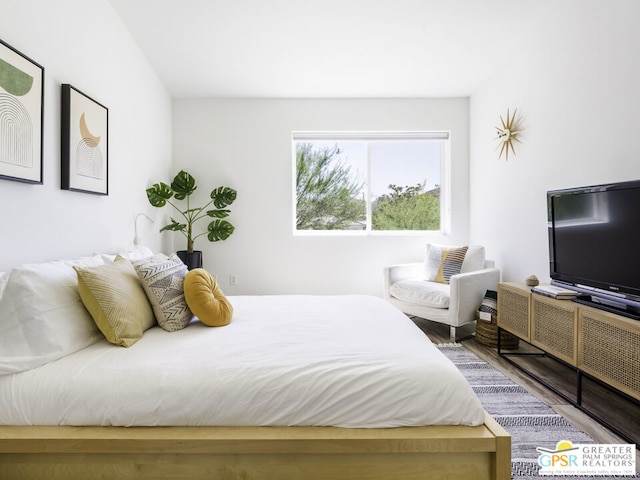 bedroom with hardwood / wood-style floors