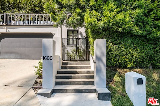 property entrance with a garage