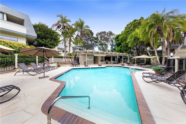 view of swimming pool featuring a patio