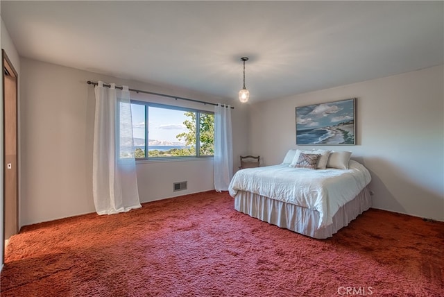 bedroom featuring carpet