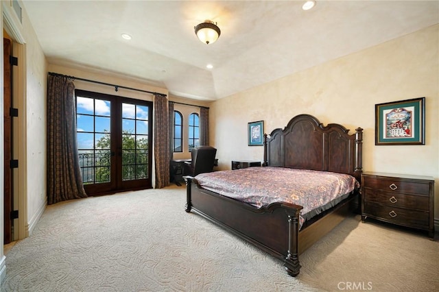 carpeted bedroom with french doors