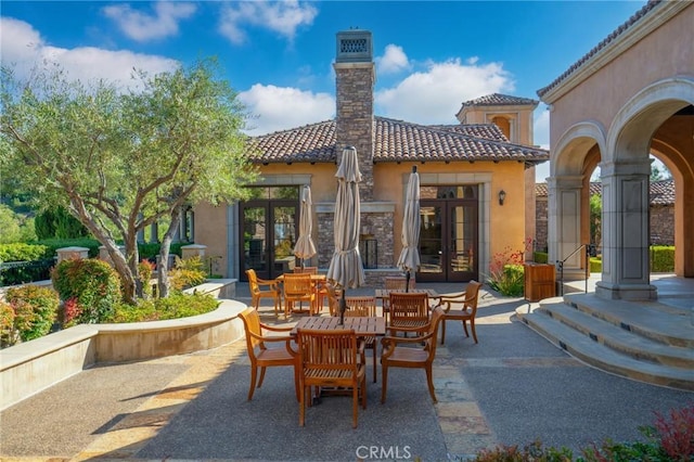 view of patio / terrace featuring french doors