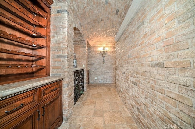 wine area with brick ceiling and brick wall