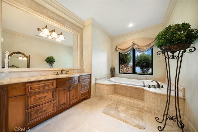 bathroom with tile patterned floors, tiled tub, vanity, and ornamental molding