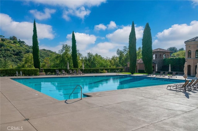 view of pool with a patio