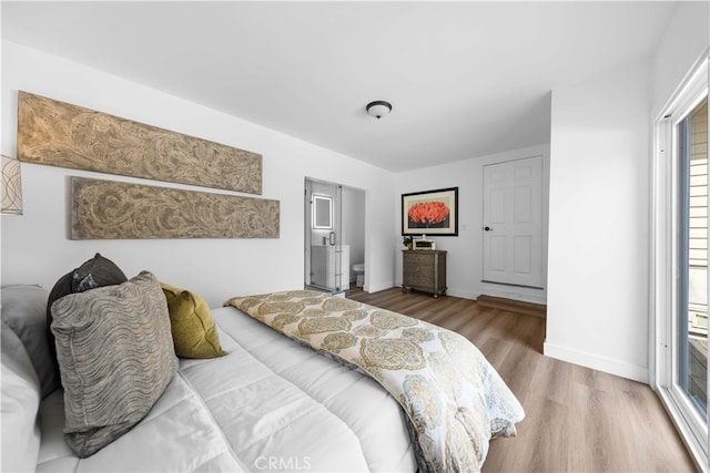 bedroom featuring hardwood / wood-style floors