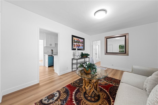 living room with light hardwood / wood-style flooring