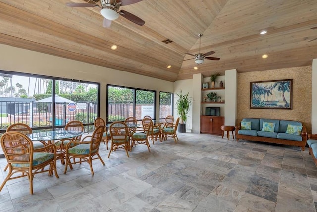 interior space featuring wood ceiling, ceiling fan, and high vaulted ceiling