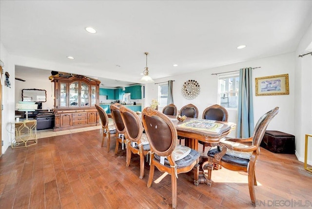 dining space featuring light hardwood / wood-style flooring