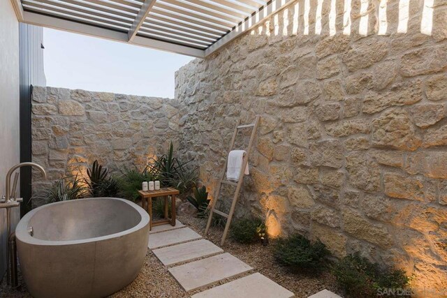 view of patio / terrace featuring a pergola