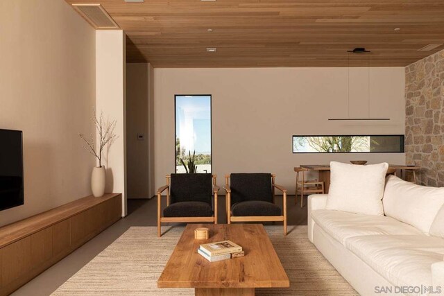 living room featuring wooden ceiling