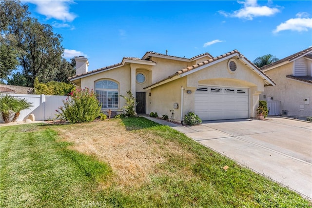 mediterranean / spanish house featuring cooling unit, a garage, and a front lawn