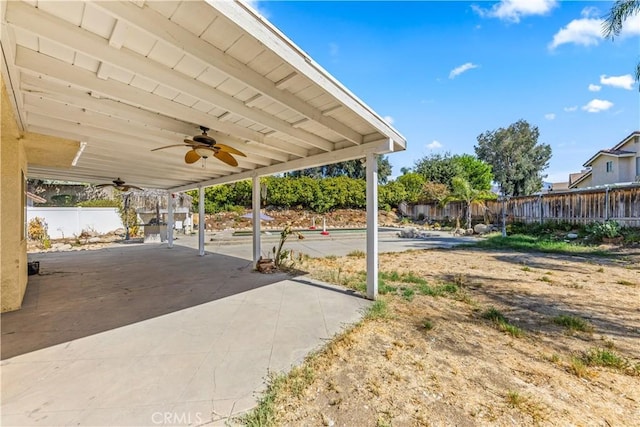 view of patio / terrace with a fenced backyard and ceiling fan
